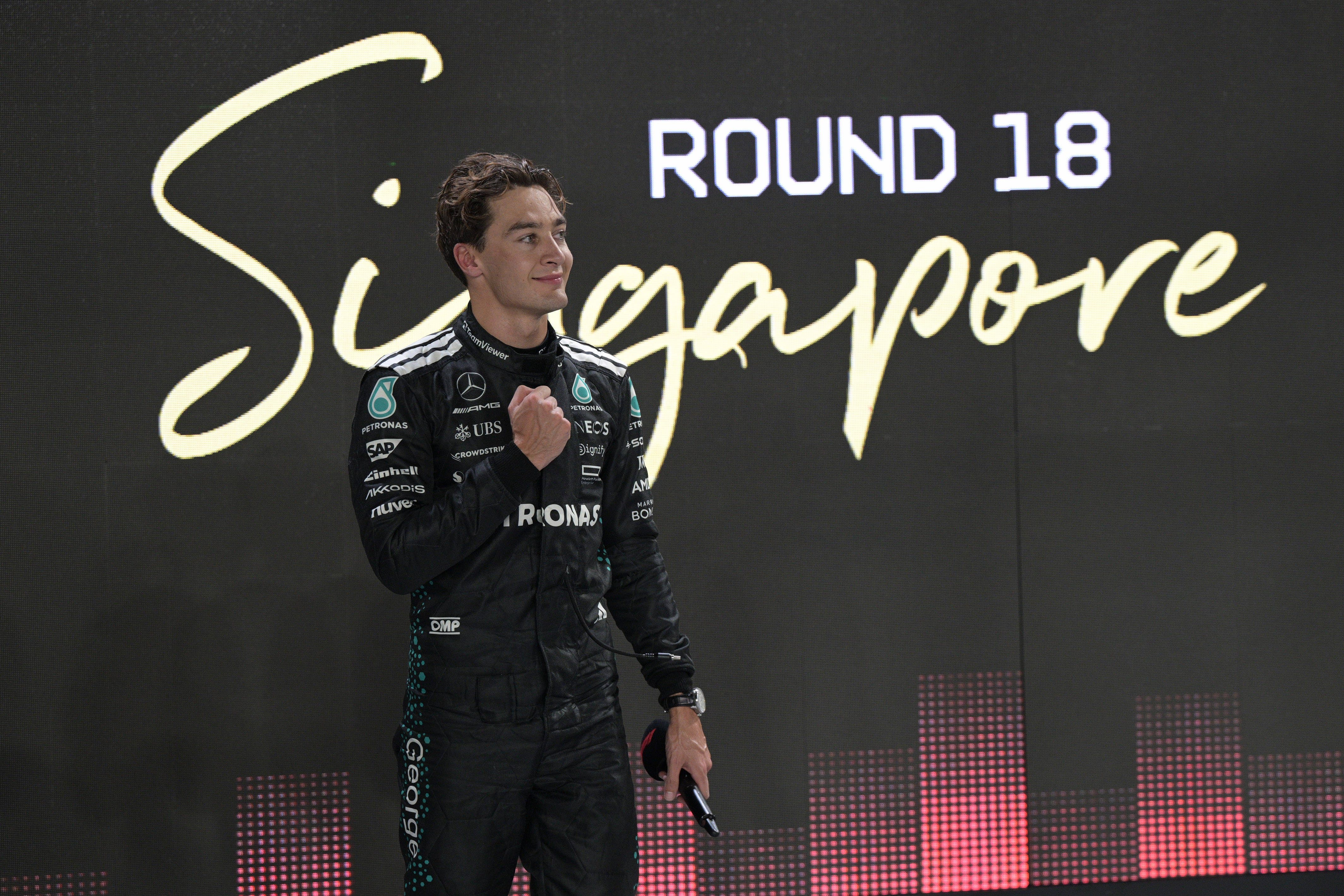 爱游戏娱乐-迈凯伦险胜梅赛德斯，拉塞尔点燃赛场